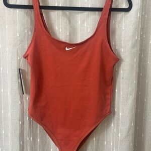Nike Coral tank bodysuit. New with tags.